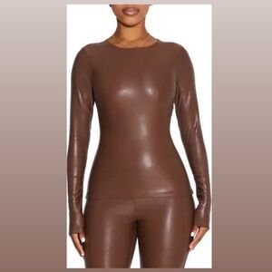 *NEVER WORN* That Extra Drip Faux Leather Top
N BY NAKED WARDROBE